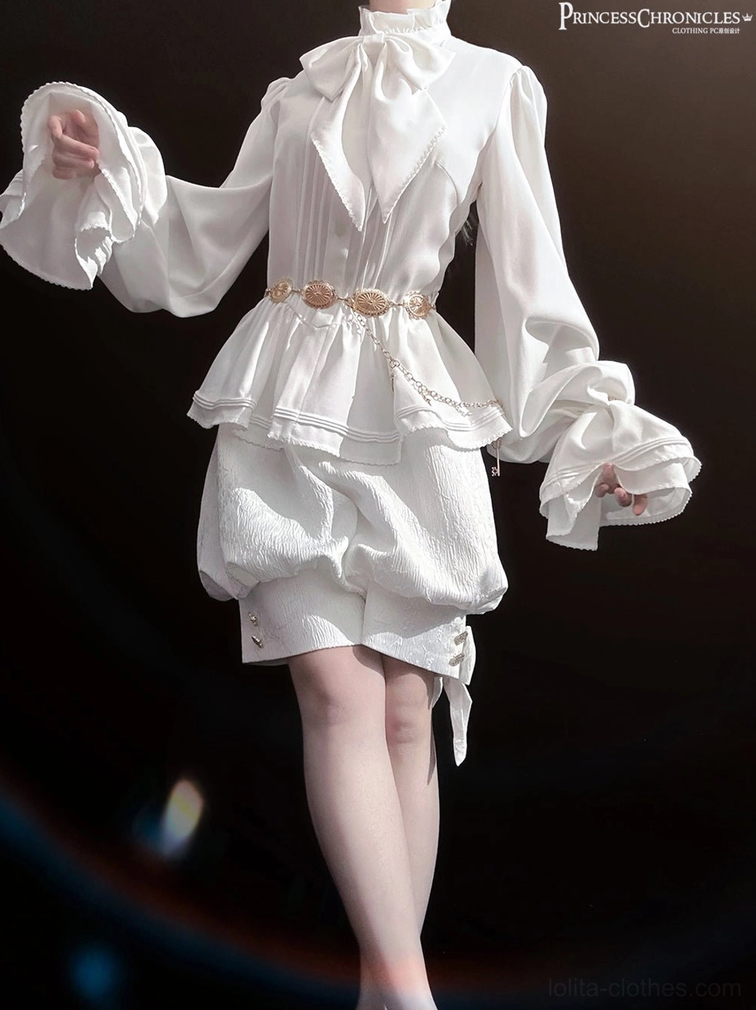 Side view of white Ouji lolita outfit with loose bubble shorts featuring button details and flared shirt cuffs with metal waist chain positioned at hip
