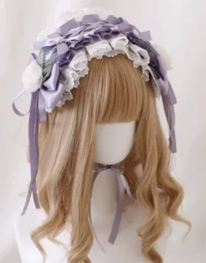 Lolita hair headband KC with multi-layer lace satin bows and cascading ribbons worn on blonde mannequin with shoulder-length wavy hair