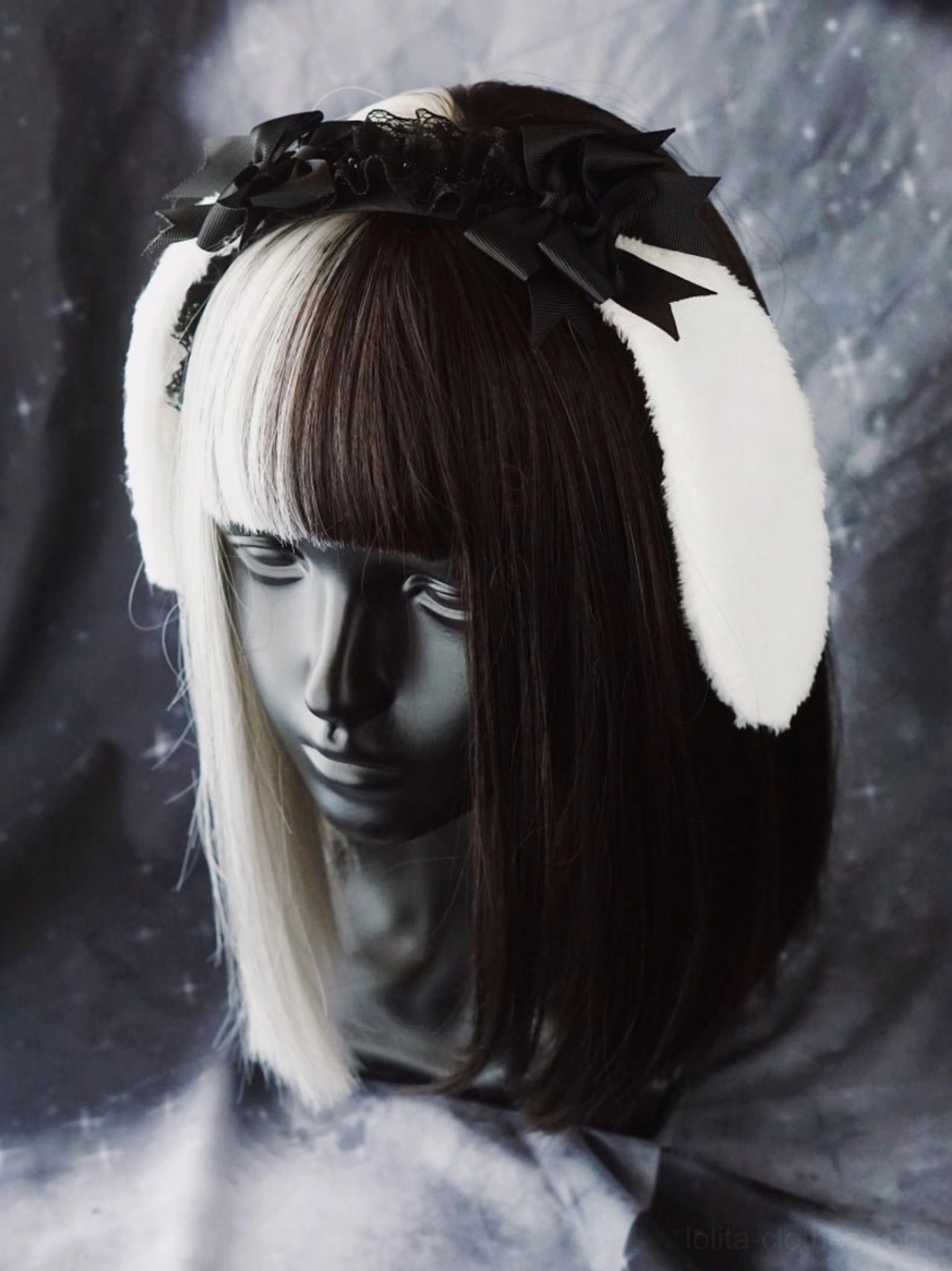 Gothic lolita hair accessory in layered hairstyle context showing how to style with braids ringlets and half-up arrangements for maximum impact