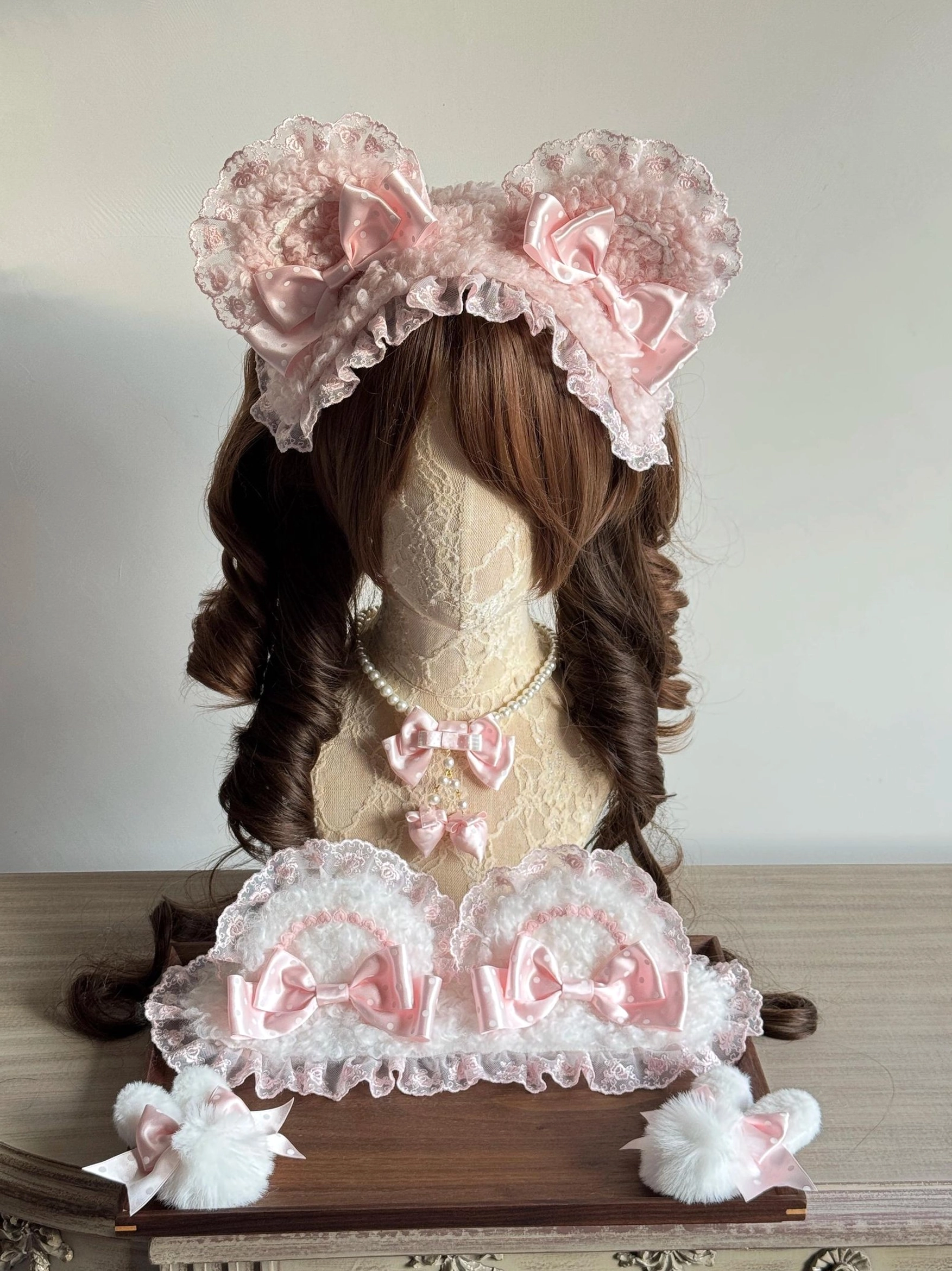 Lolita handmade bear ear headband pink-white colorway overhead studio display matching hair clips bow neck accessory