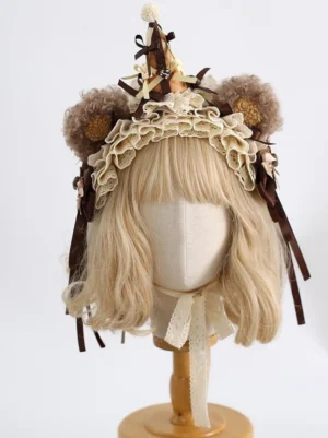 Kawaii lolita headdress with fluffy brown bear ears and decorated party hat displayed on blonde mannequin wig stand showing front three-quarter view of layered off-white ruffled lace and dark brown satin ribbons