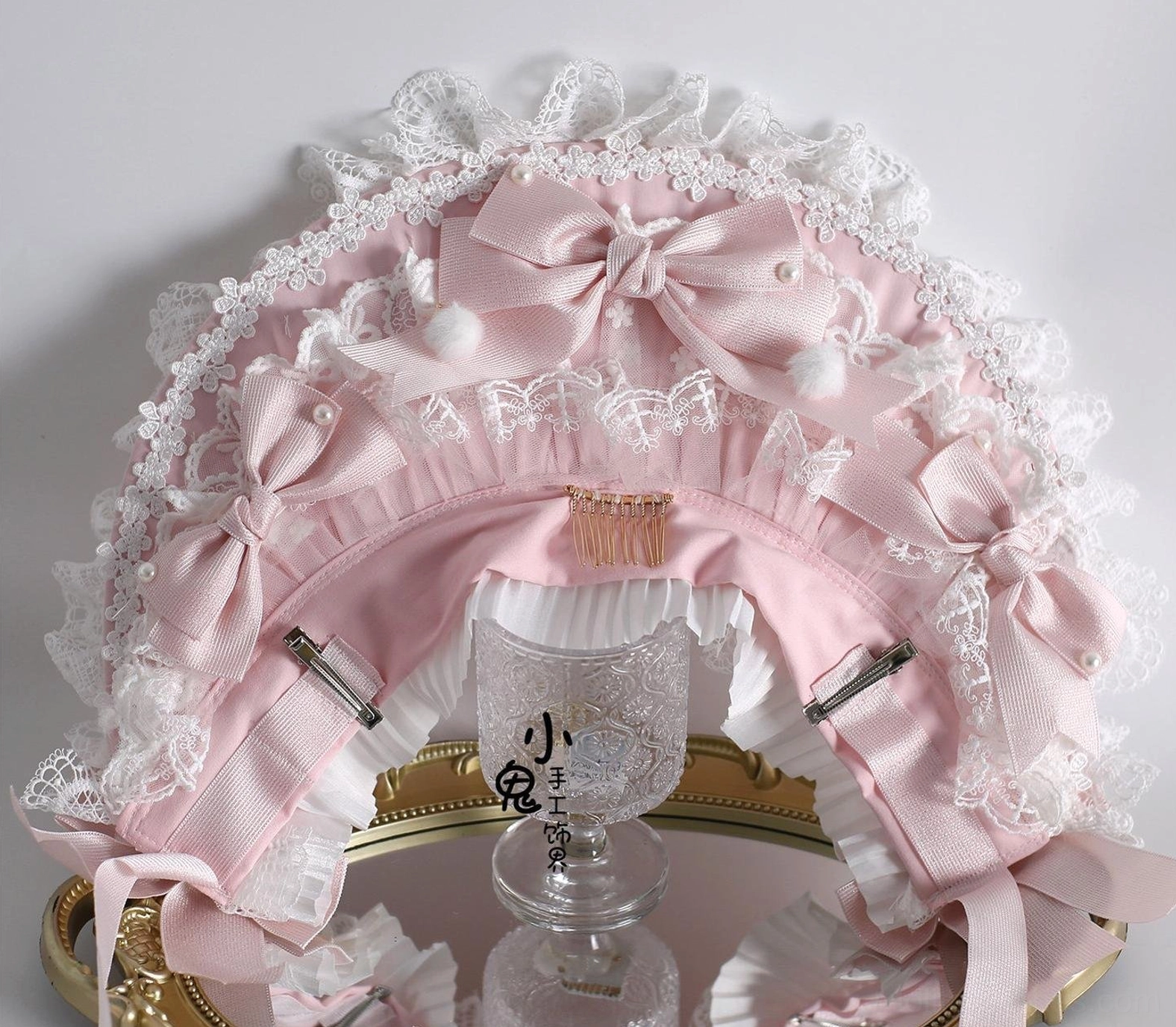 Lolita headdress accessory collection detail shot, white and pink color palette, lace embroidery, ribbon details for Sweet Lolita styling and coordination