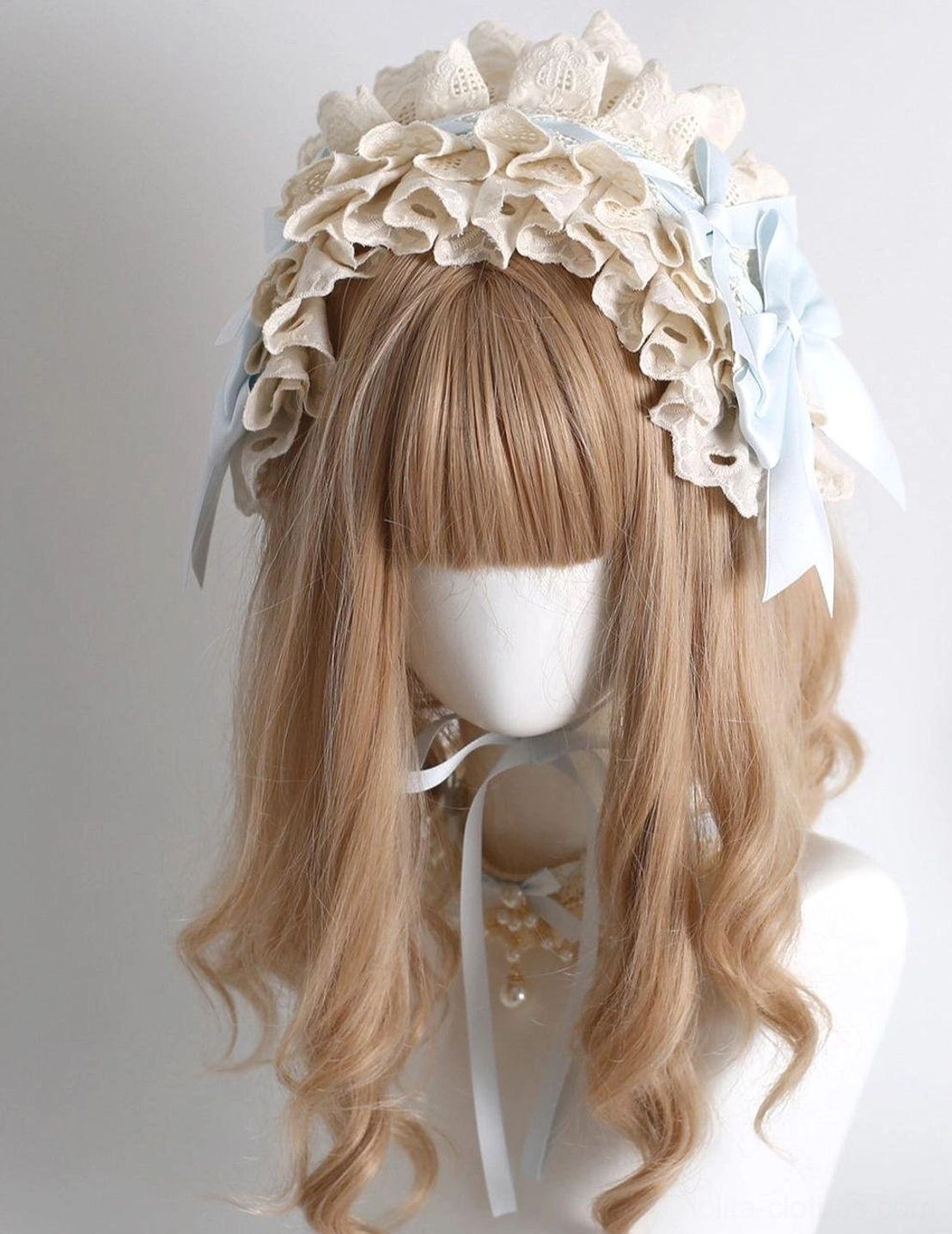 Lolita headdress set styled on mannequin showing how to wear mini hat clip headband choker and wrist cuffs together coordinated