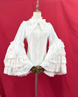 Lolita blouse with detachable stand collar bow, cream white hue, front center view displaying multi-layer ruffled bell sleeves and buttoned lace trim detail