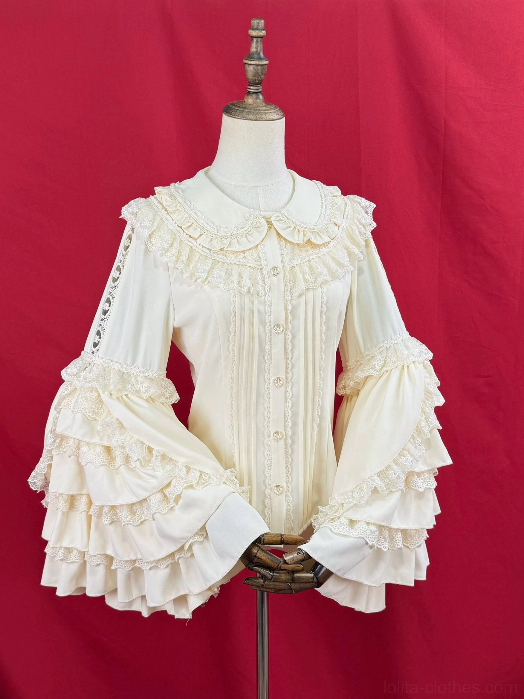 Lolita hime sleeve blouse sleeve detail close-up, multi-layered ruffled bell sleeve construction, lace accent trim, fabric drape and volume showcase