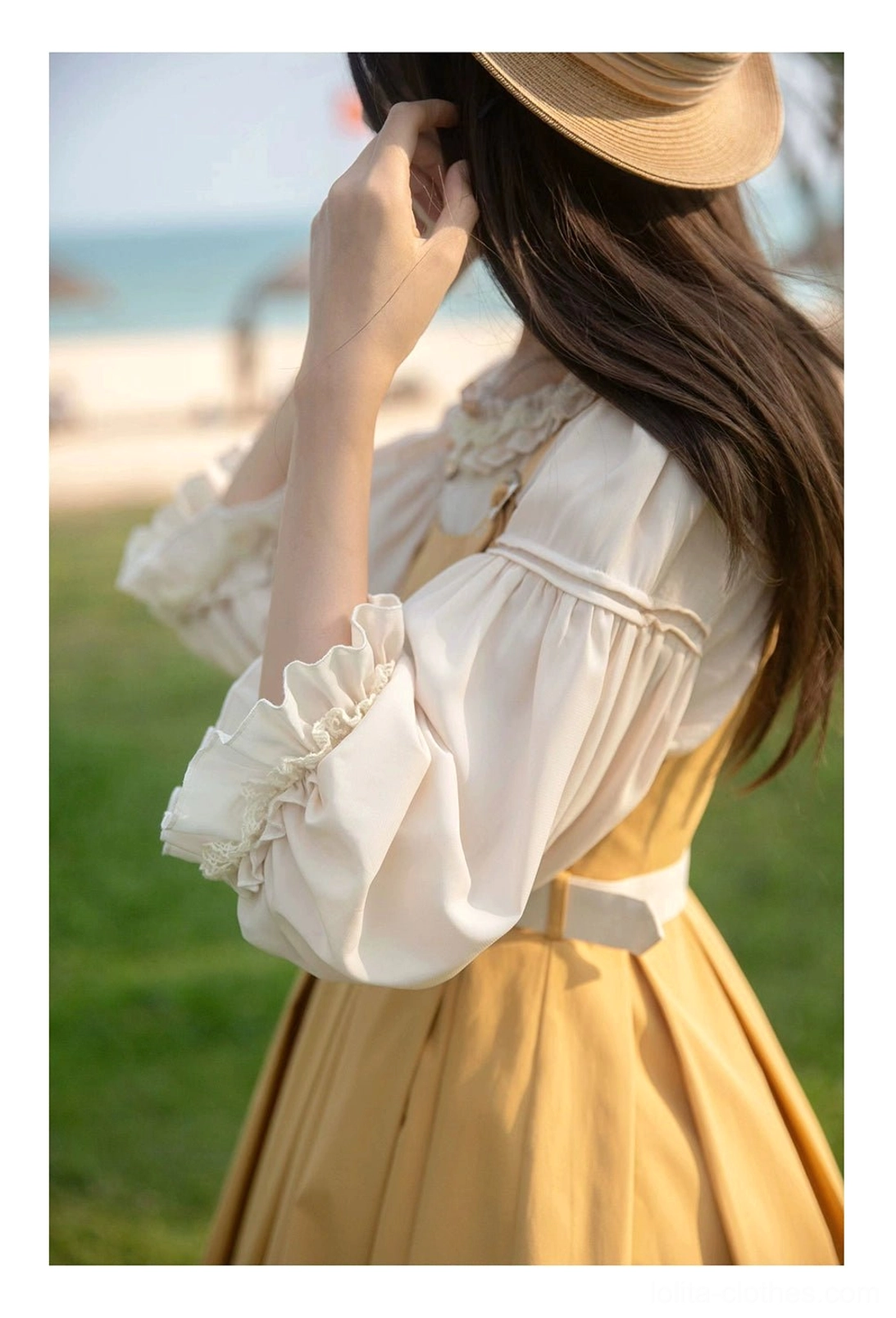 Close-up detail of Lolita inner blouse lantern sleeve with ruffled lace cuffs elastic design cream white color side view showcase
