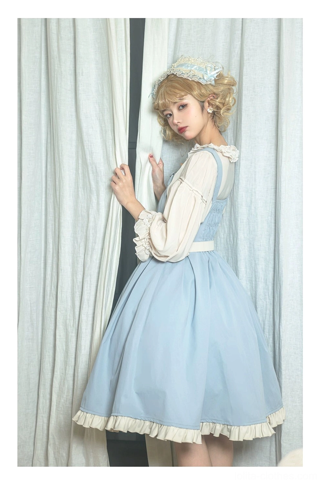 Lolita inner blouse ruffles and pintucks detail showing refined Victorian-inspired design lace trim neckline construction
