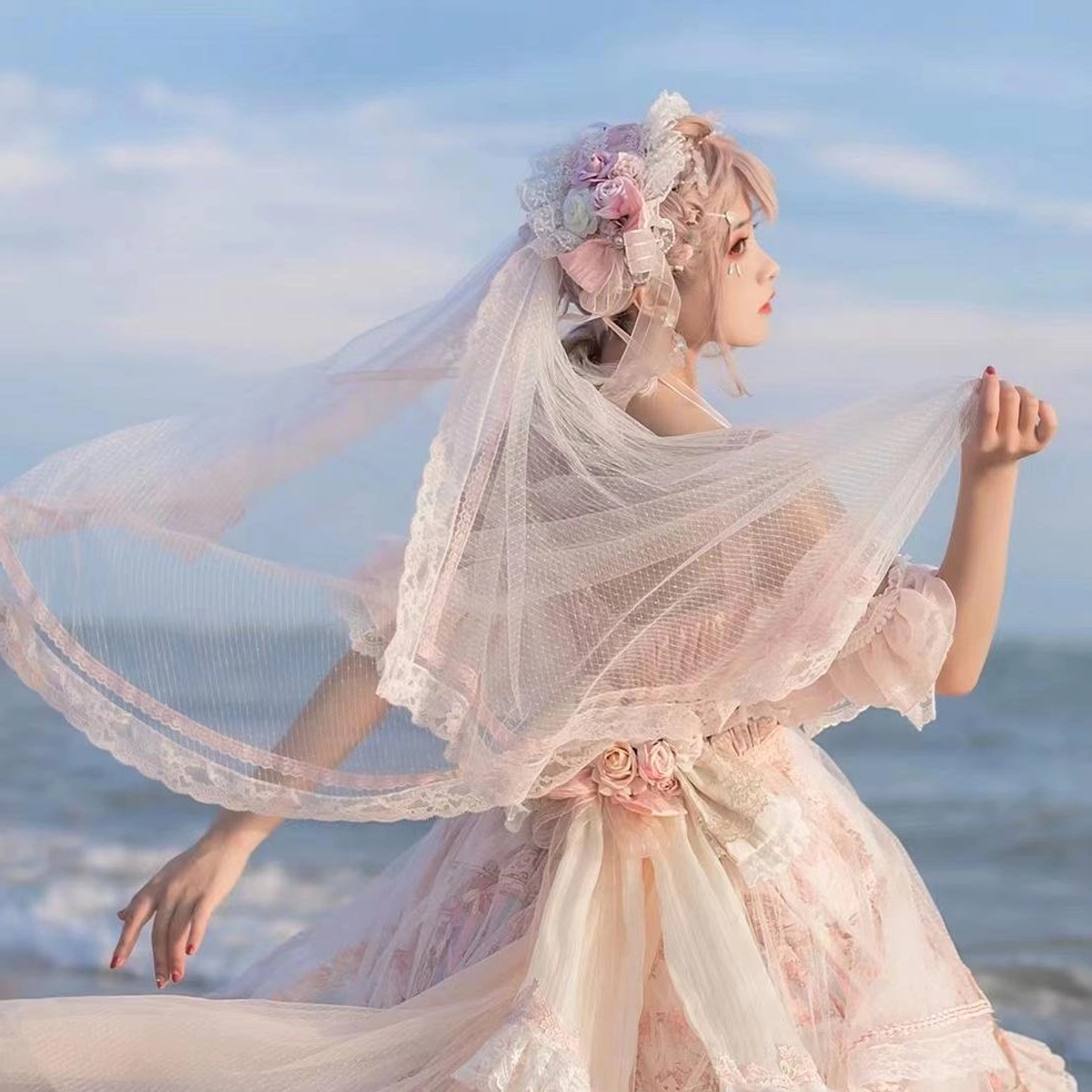 Wedding Lolita JSK dress back large waist bow and train construction showing dramatic silhouette