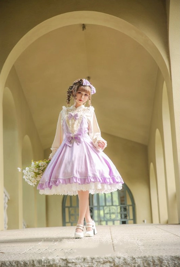 Lolita jsk dress bow decoration fabric detail with chain ornament brooch attachment close-up