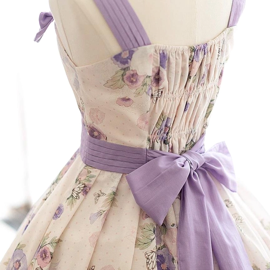 Color accuracy and lighting variation disclaimer example showing same lolita JSK dress under different lighting conditions for buyer reference