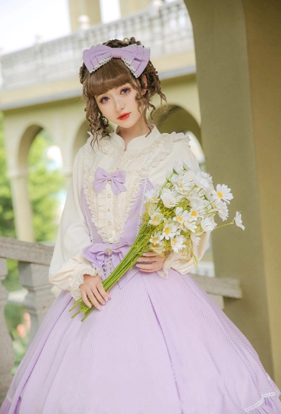 Lolita jsk dress construction detail seam stitching waist bow attachment close-up view