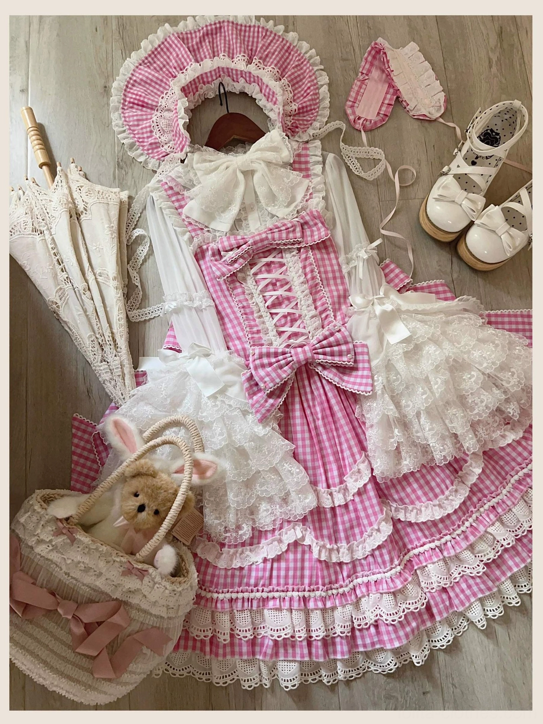 Old school Lolita JSK dress in pink gingham, cultural significance and lolita fashion history context information showing old school substyle development and aesthetics