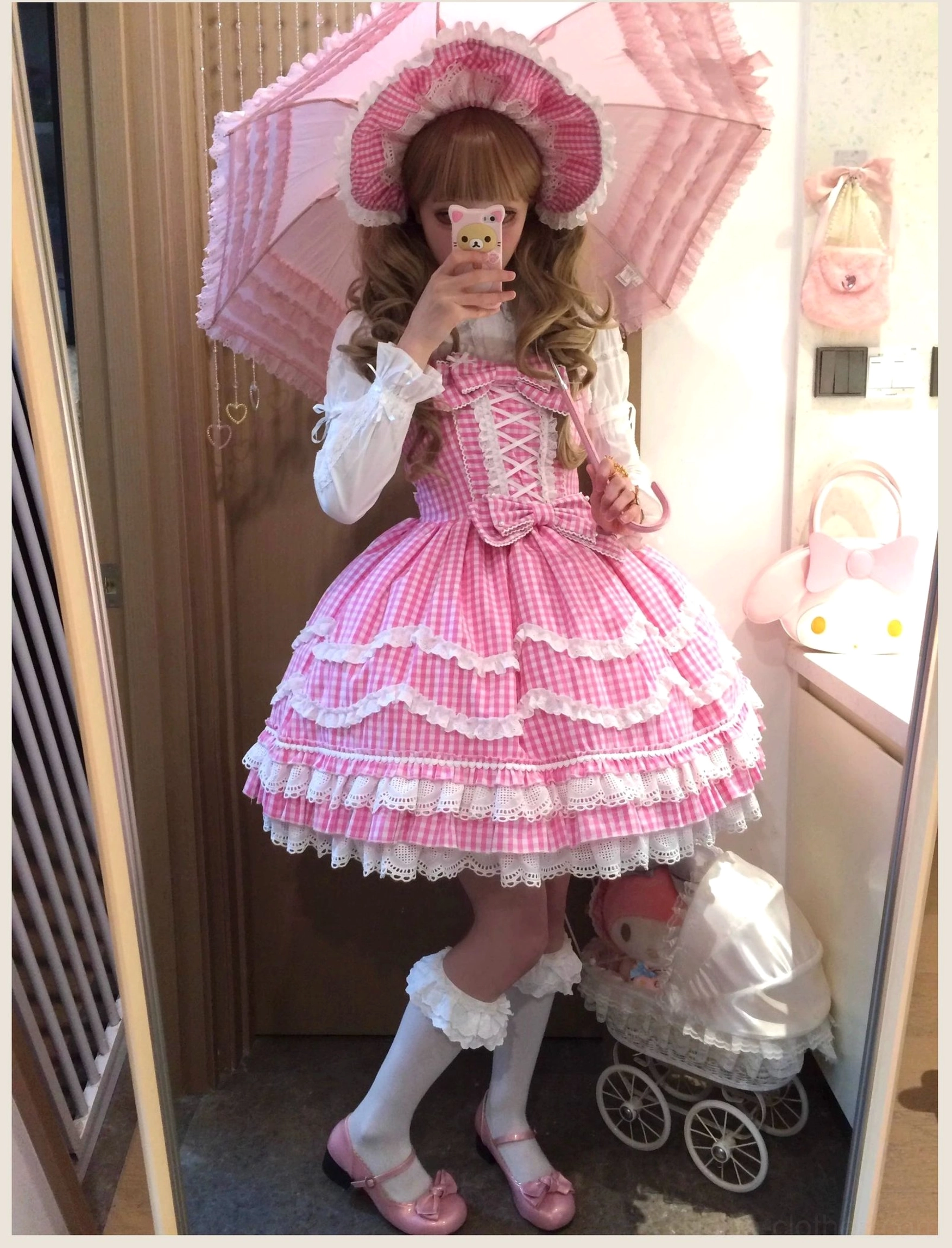 Pink gingham old school Lolita JSK dress with heart-shaped lace details, close-up view highlighting the romantic vintage aesthetic and 90s sweetness design elements
