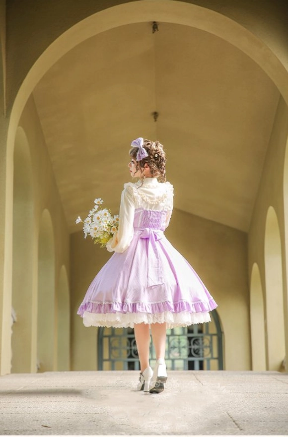 Lolita dress puff sleeve detail construction ruffled shoulder cuff close-up view