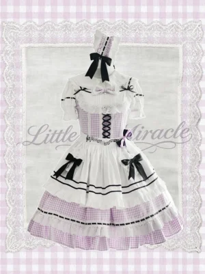 Classic Lolita JSK dress with white apron overlay dual black bows layered ruffled gingham skirt and decorative headpiece