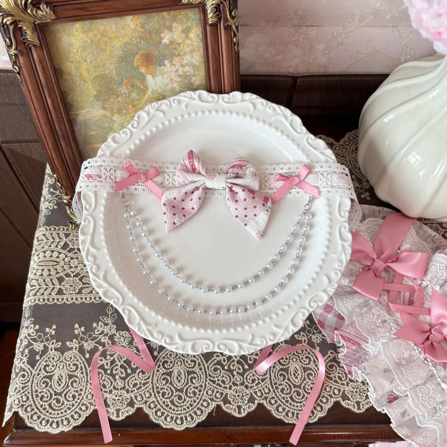 Embossed chiffon fabric close-up texture of floral printed wedding lolita JSK showing delicate embossed pattern and high-quality material construction details
