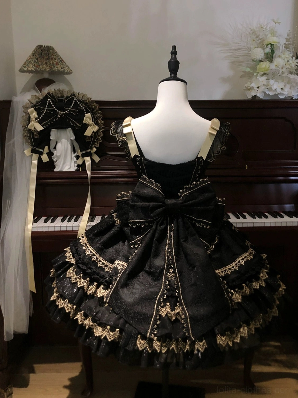 Lolita jumper dress fabric detail shot showcasing four-way stretch material and artificial pearl decoration quality and construction