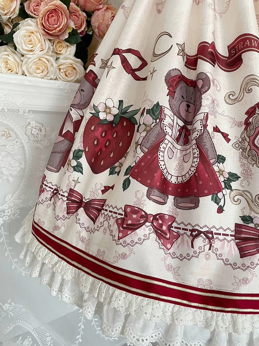 lolita jsk close-up flat lay detail shot burgundy strawberry bear bow prints lace trim hem ivory fabric