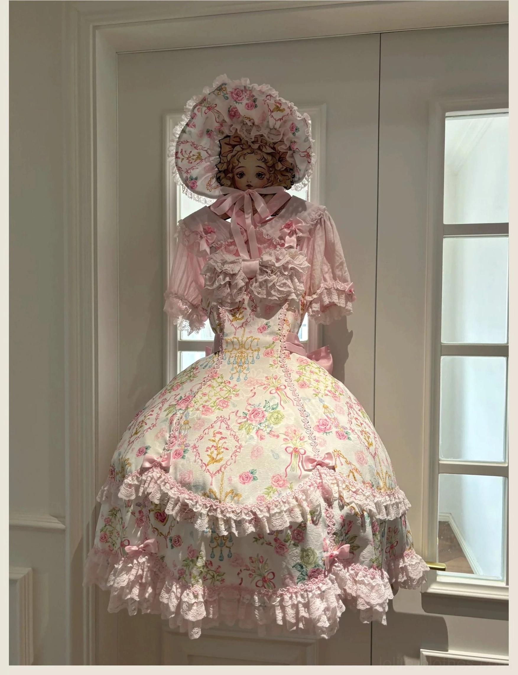 Old school Lolita JSK dress showing satin waist bow detail and elastic shirred back construction with adjustable ties