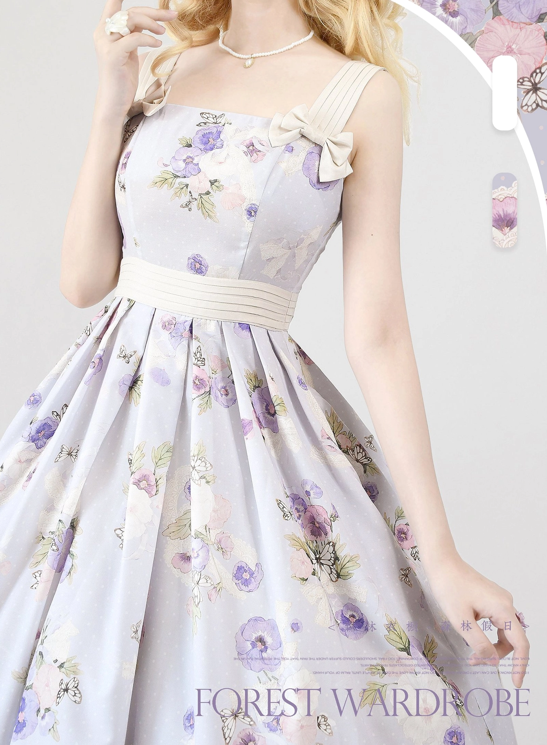 Shoulder strap and bow embellishment detail of lolita JSK dress showing construction quality, bow decoration design, and shoulder fit on model