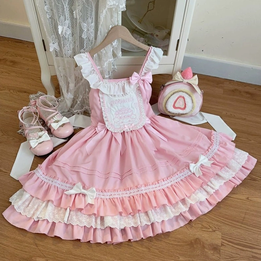 Pink sweet Lolita JSK dress flat lay side front view on hanger satin bow accents skirt hem layered lace ruffles pleated skirt texture details