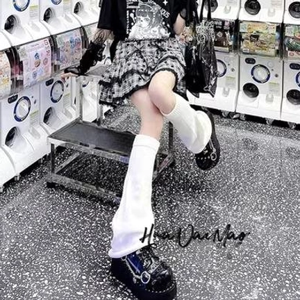 Lolita knit leg warmers winter fashion ribbed texture loose fit mid-calf length accessory detail shot