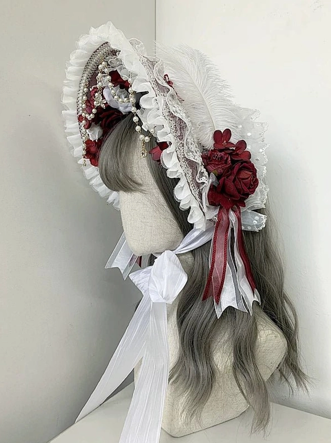 Gothic and classic lolita lace bonnet collection detail shot showing lace texture cross pendants and embellishments