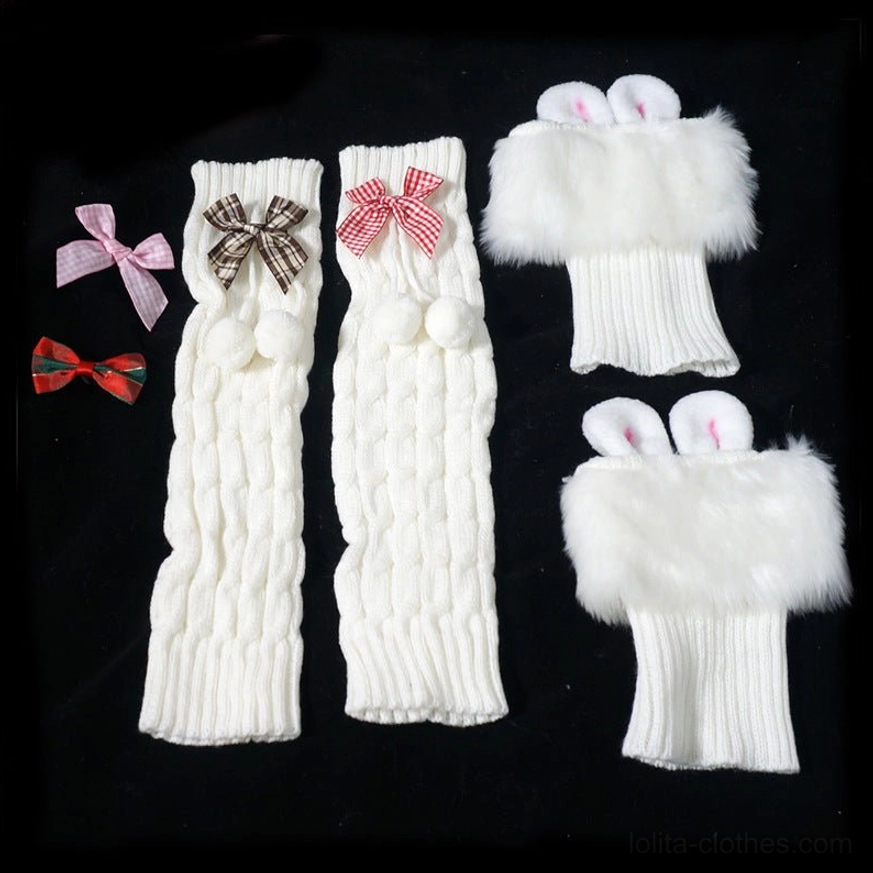 Lolita leg warmer accessory set flat lay display showing two pairs long knitted leg warmers two rabbit ear fluffy cuffs four decorative bows off-white base assorted colors