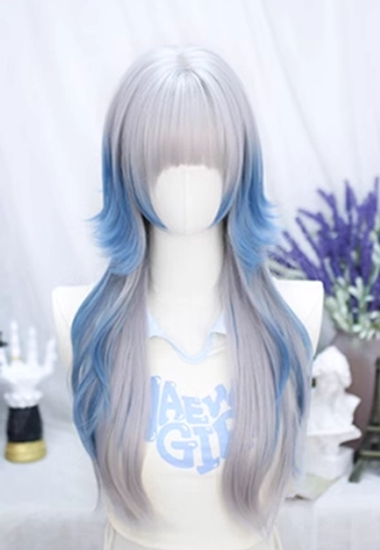Front three-quarter right angle view of gray-blue ombre lolita long curly wig with blunt bangs, layered waves, and fairycore aesthetic styling