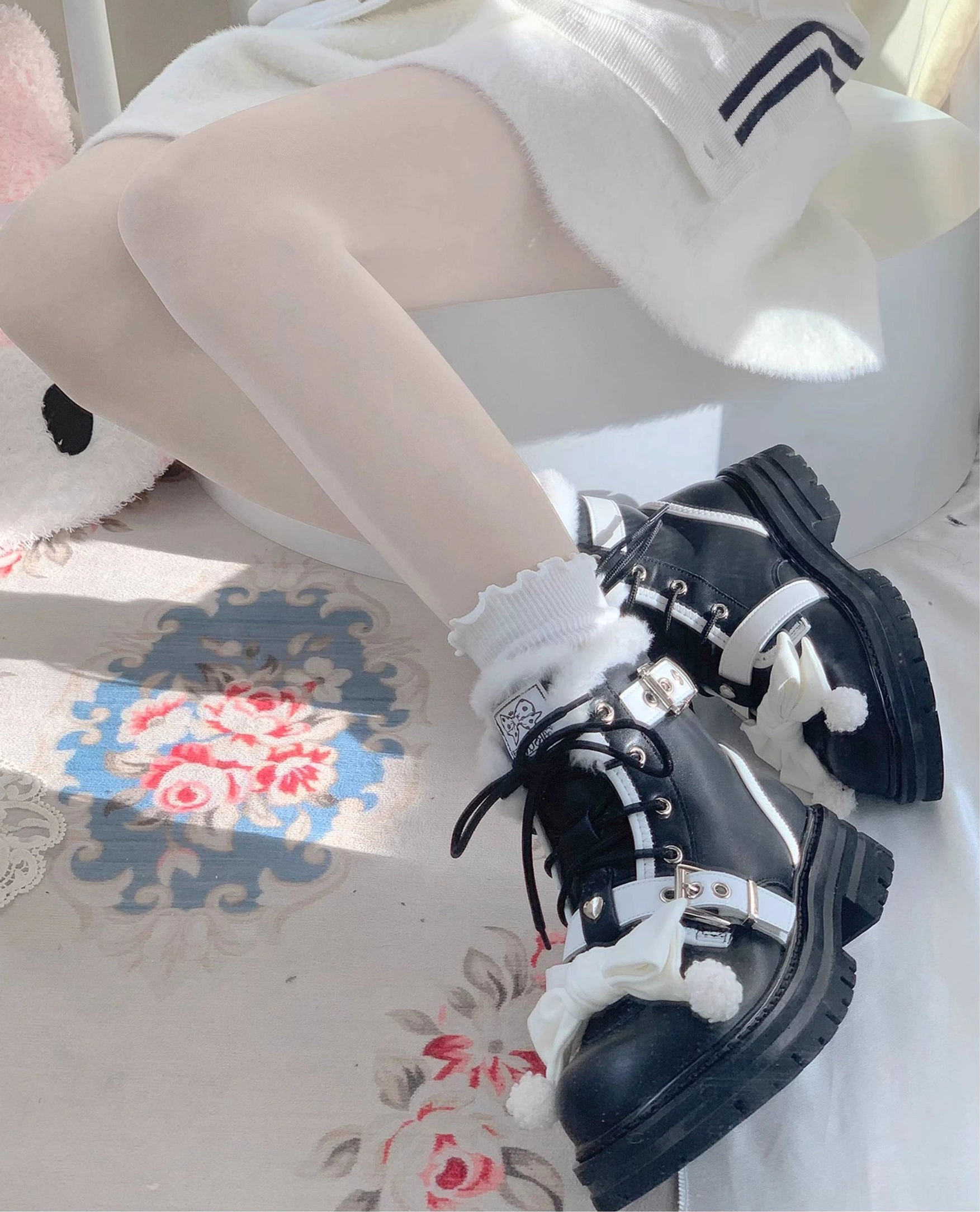 Lolita martin boots side view legs wearing boots sheer white tights frilled socks thick platform soles white bow fuzzy ankle lining