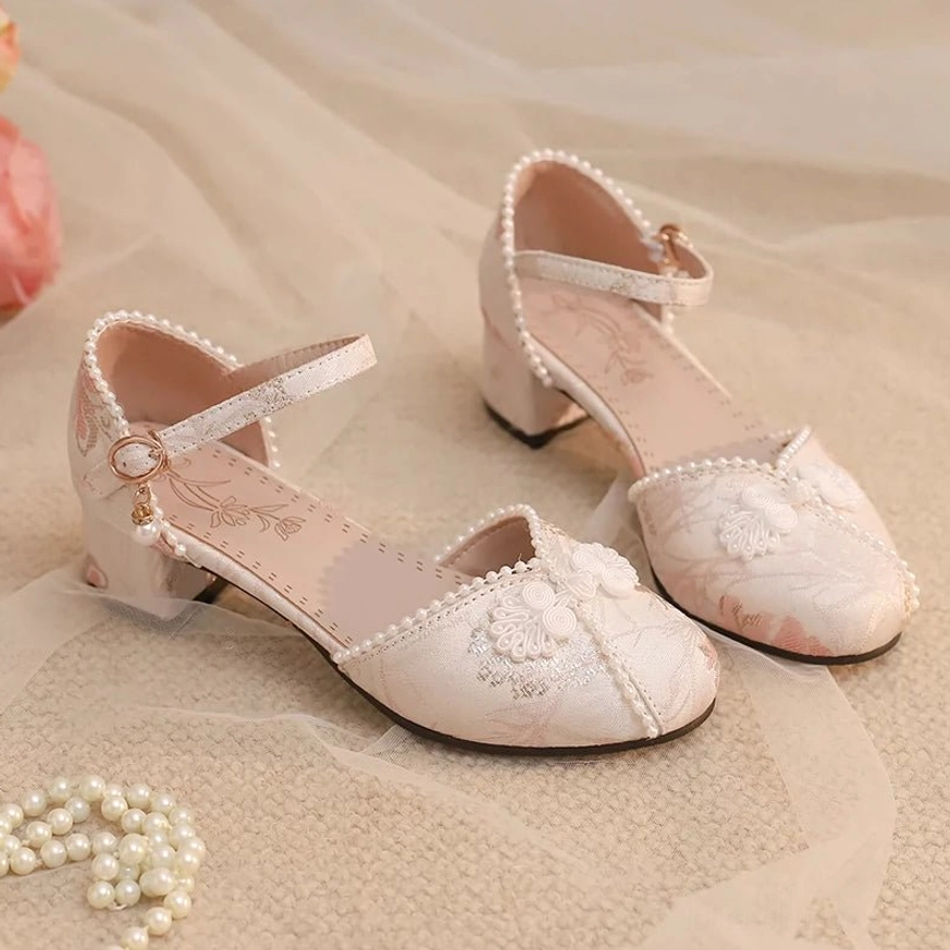 Lolita Mary Jane shoes blue chunky heel close-up pearl trim ankle strap secure fit assurance