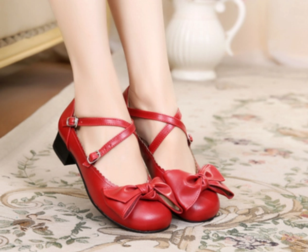 Dark blue lolita bow cross-strap shoes detail of adjustable straps and closure system