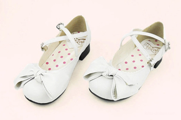 Champagne gold lolita bow cross-strap shoes detail of metallic finish and bow design