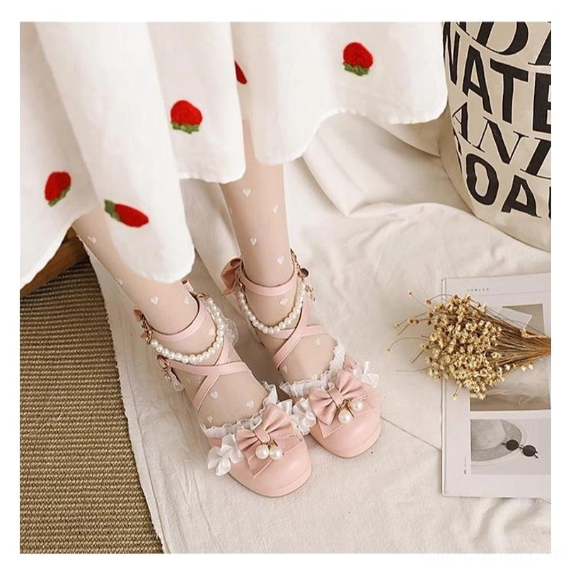 Lolita Mary Jane shoes close-up showing high-quality hardware and durable PU construction with intricate bow and pearl accent craftsmanship details