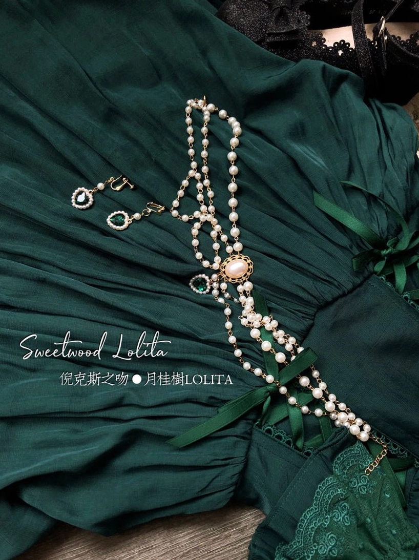 French Lolita one-piece dress chest bow and bodice ruffled detail, intricate lace trim design close-up