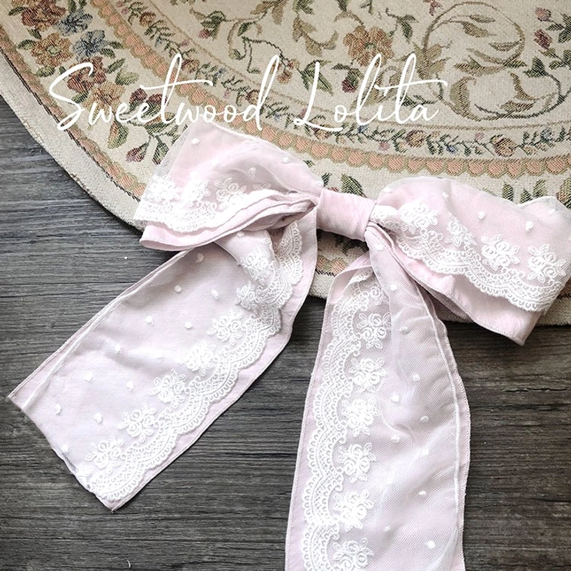 Matching hair clips accessory for French Lolita one-piece dress, vintage-inspired bow design to coordinate with dress colors