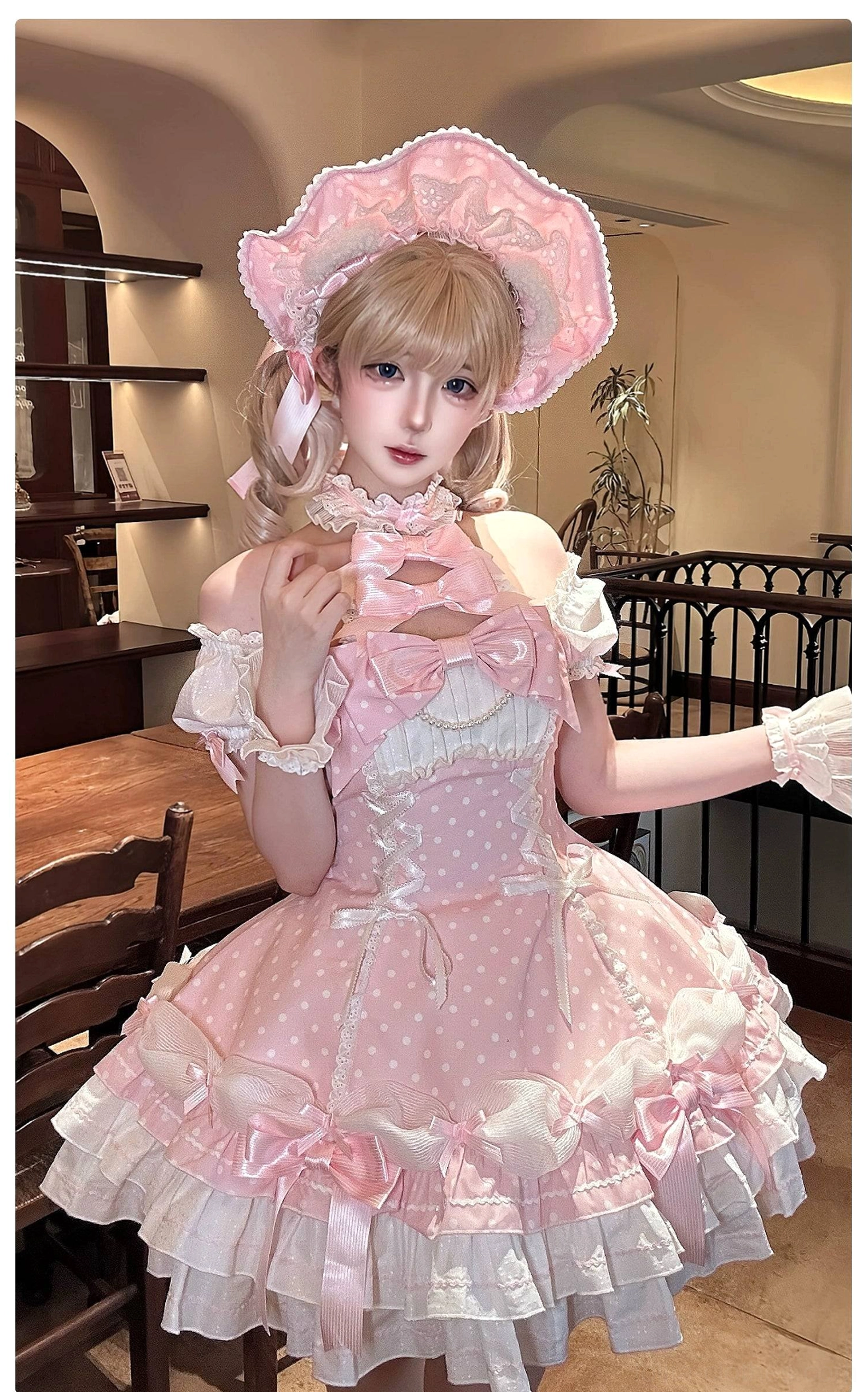 Old School Lolita polka dot OP dress back waist bow detail showing large removable bow decoration and lace-up closure