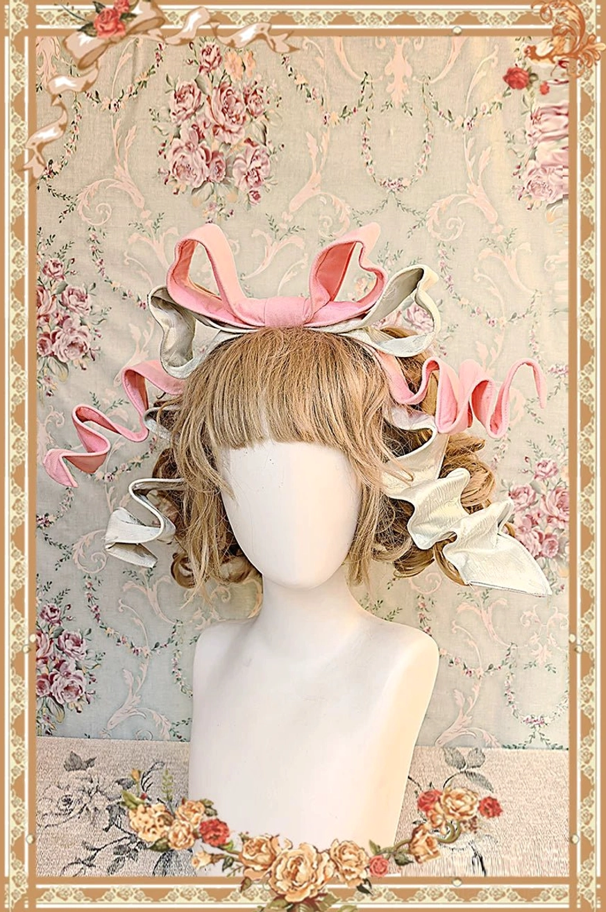 Detachable bow accent of vintage lolita OP dress showing interchangeable design element for mix-and-match accessory styling flexibility