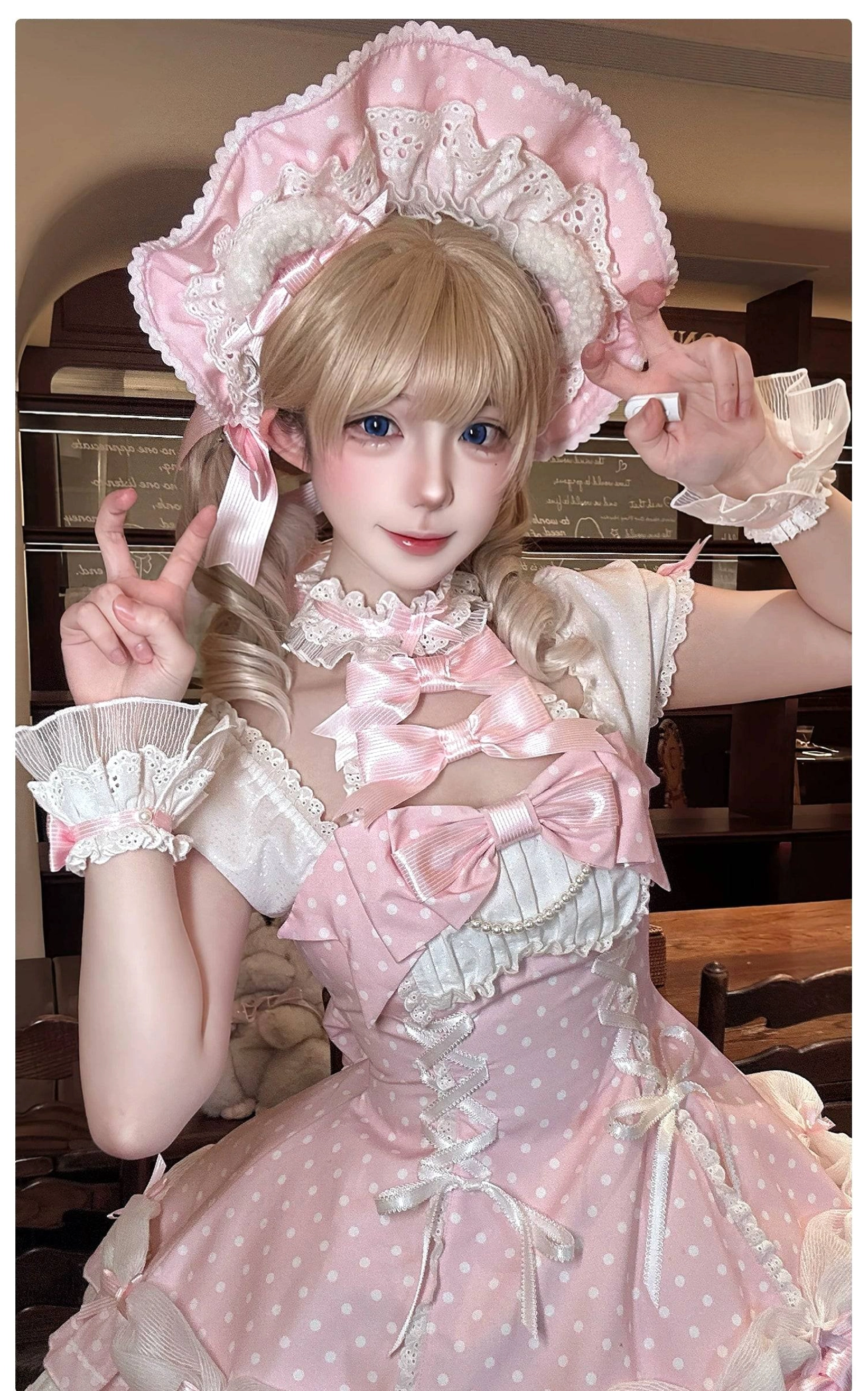 Polka dot Lolita OP dress elastic cuffs and off-shoulder wearing style detail showing adjustable sleeve mechanism