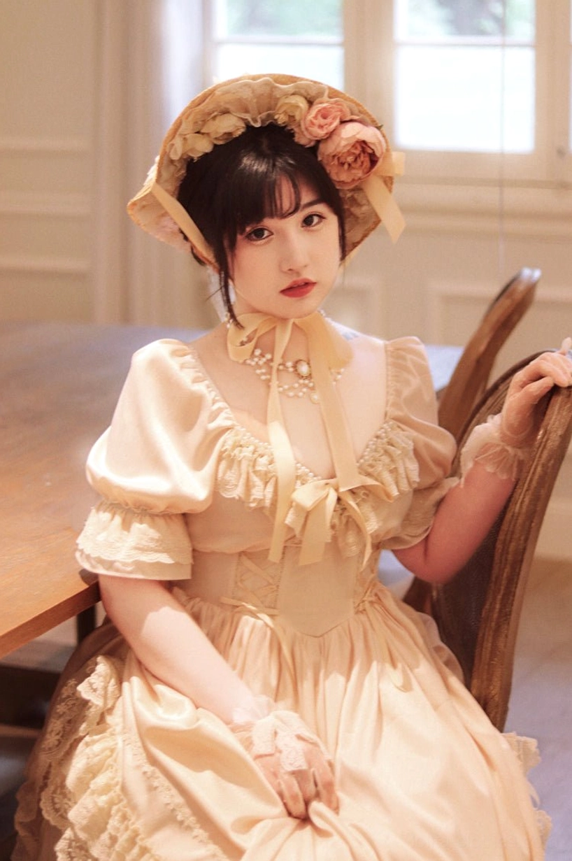 French Lolita one-piece dress with floral crown accessory showing romantic aesthetic coordination