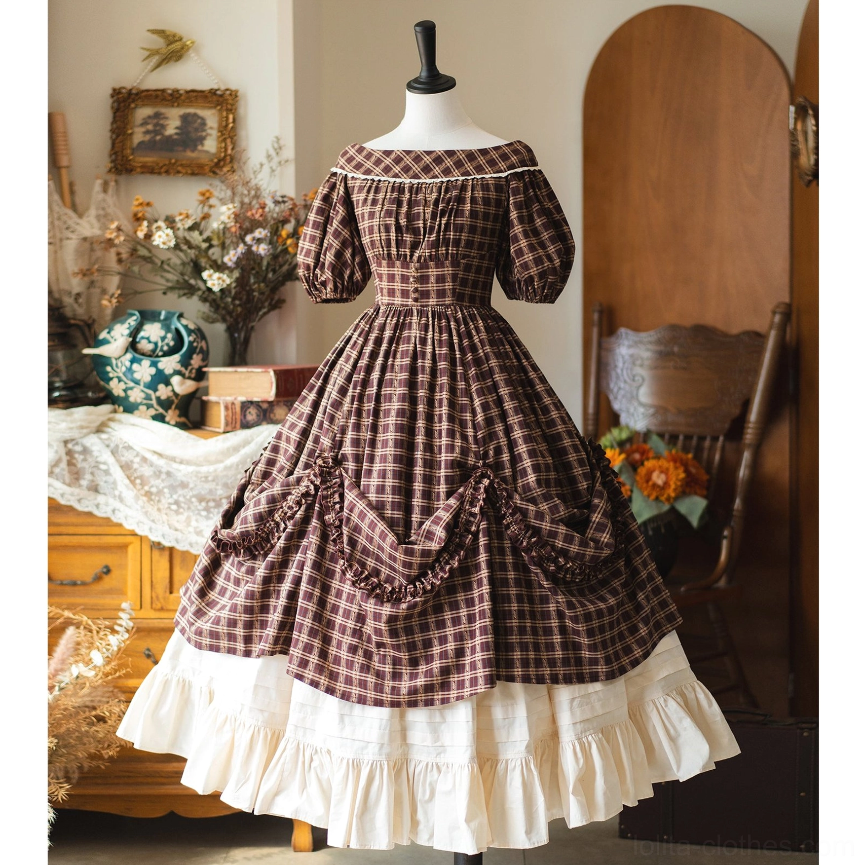 Off-shoulder plaid Lolita OP dress with layered white ruffled petticoat hem and draped skirt front details on dress mannequin