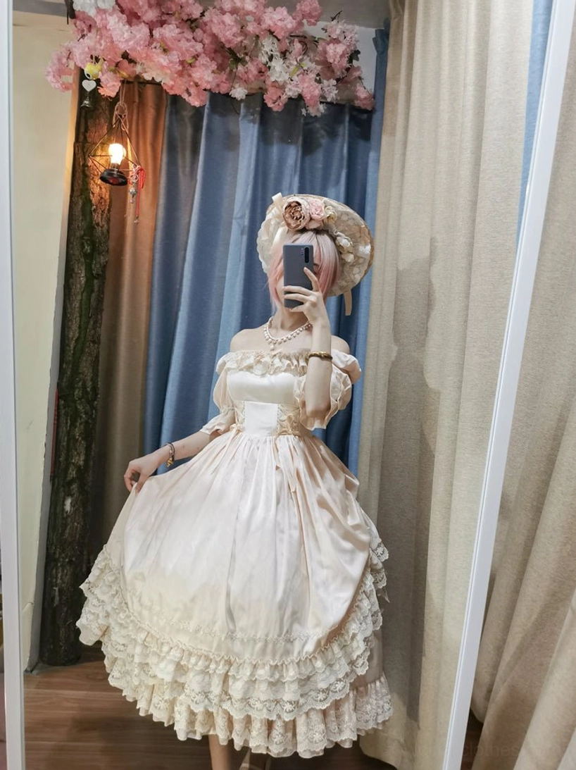French Lolita one-piece dress with knee-high socks showing classic legwear coordination for complete look