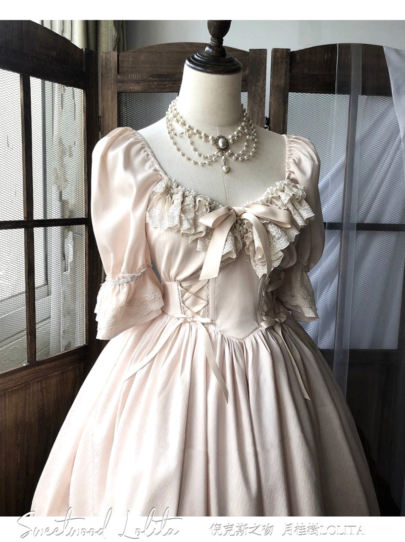 French Lolita one-piece dress with lace-trimmed stockings showing romantic legwear detail accessory