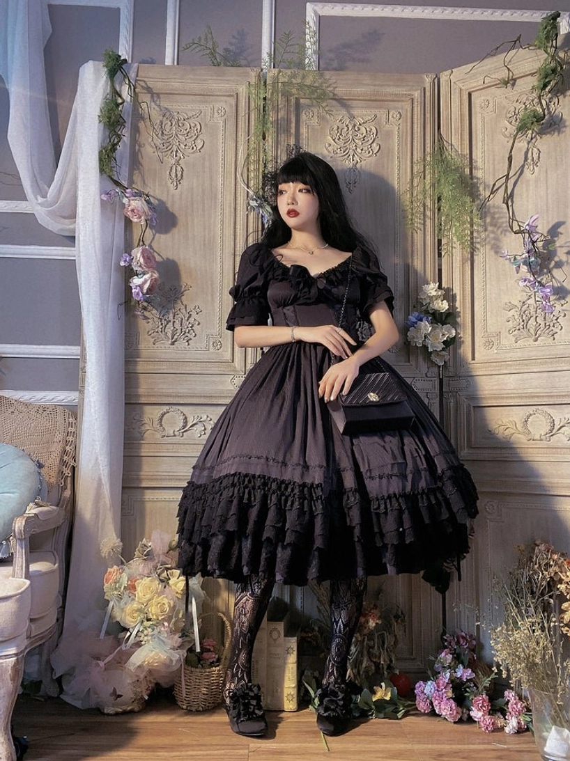 French Lolita one-piece dress featuring multi-layer tiered ruffles for visual depth and movement
