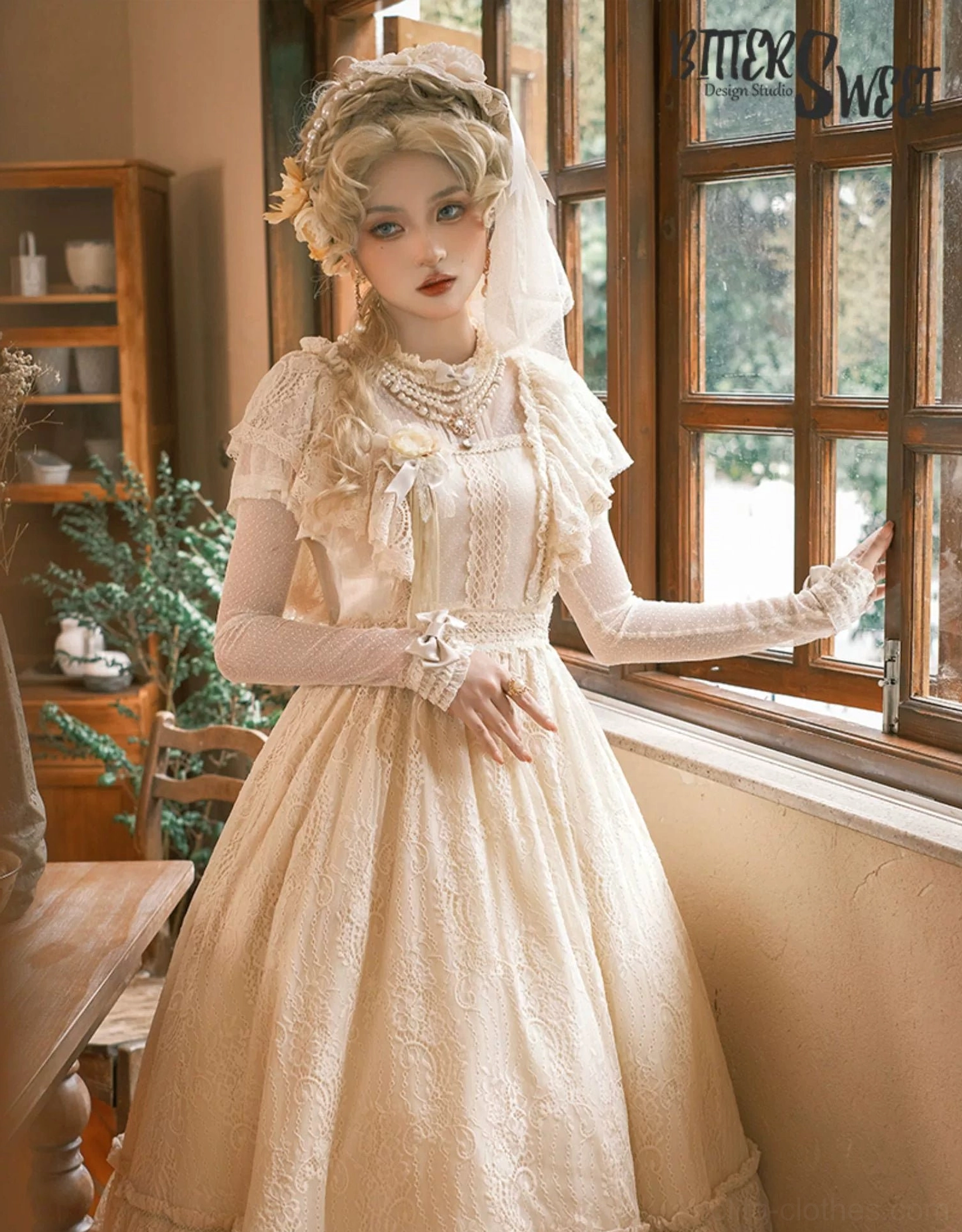 Champagne Lolita OP dress half-body side view by indoor window, model near vintage wooden cabinet, ruffled cape sleeves, sheer long sleeves, lace-trimmed bodice, hand resting on indoor wall beside window