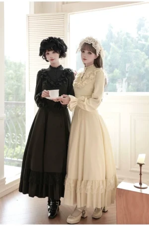 Elegant lolita long sleeve OP dress side angle view showing floor-length skirt and fitted waist with detachable shawl