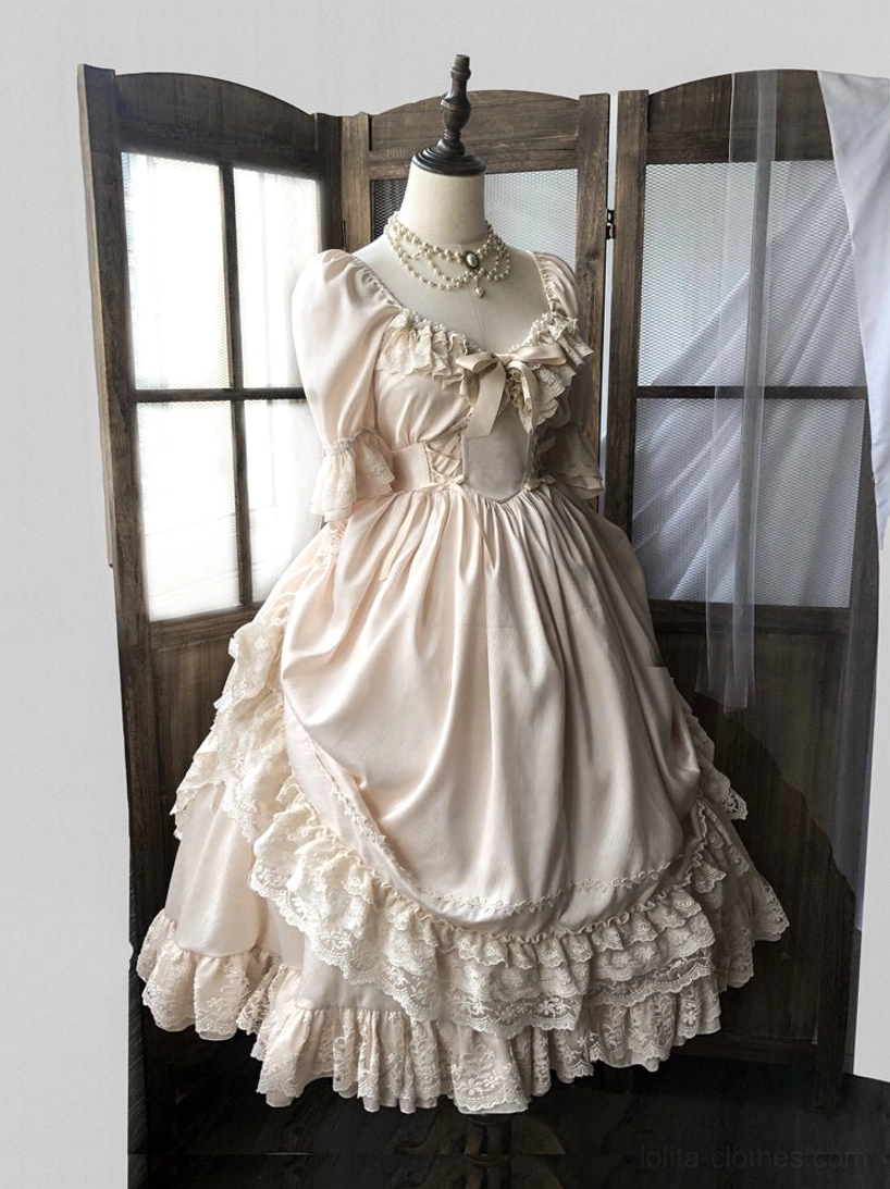 French Lolita one-piece dress with structured handbag showing complete outfit coordination styling