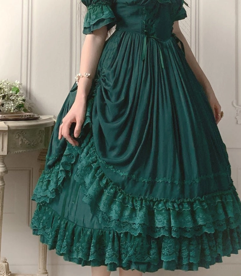 French Lolita one-piece dress styled with hair accessories and vintage-inspired jewelry coordination