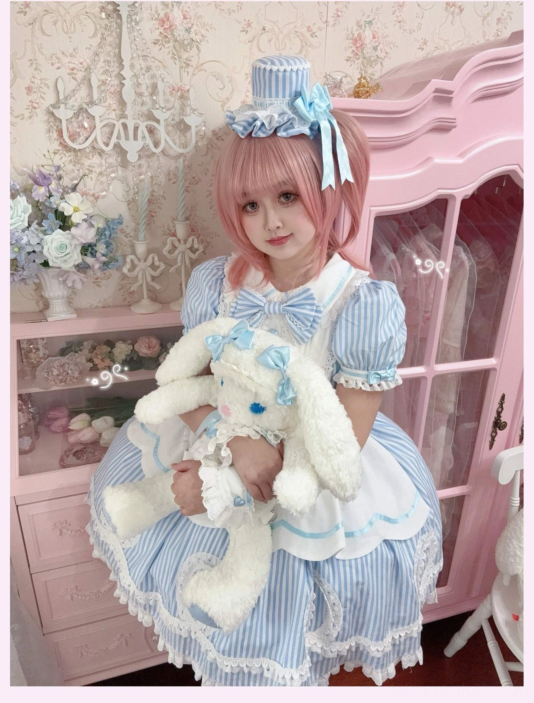 Detail shot of waist area showing satin bow placement and skirt structure on lolita OP dress