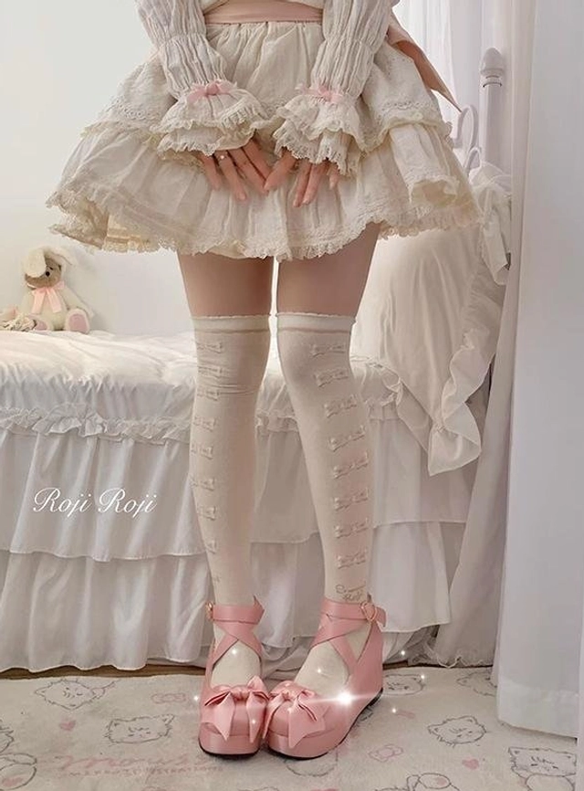 Lolita over-the-knee thigh-high socks ivory bow print solid cream off-white base beige ruffled skirt pink bow platform heels full leg front view